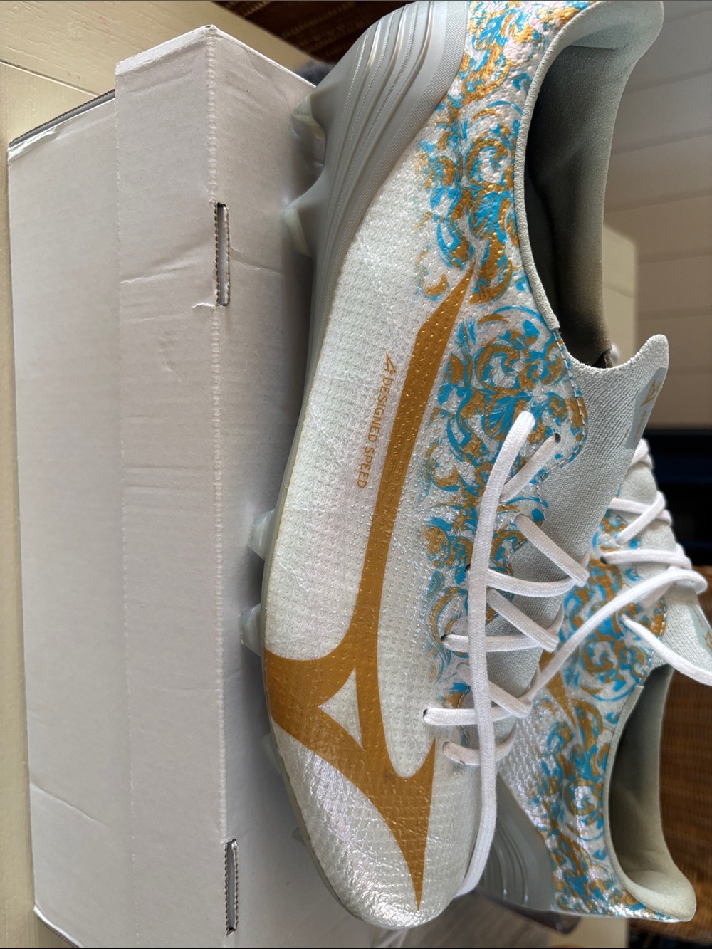Mizuno White Athletic Cleats with Gold and Turquoise Accents
